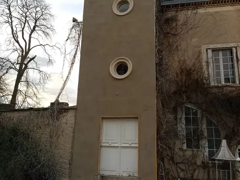 Enduit d'une tour en pierre – après travaux